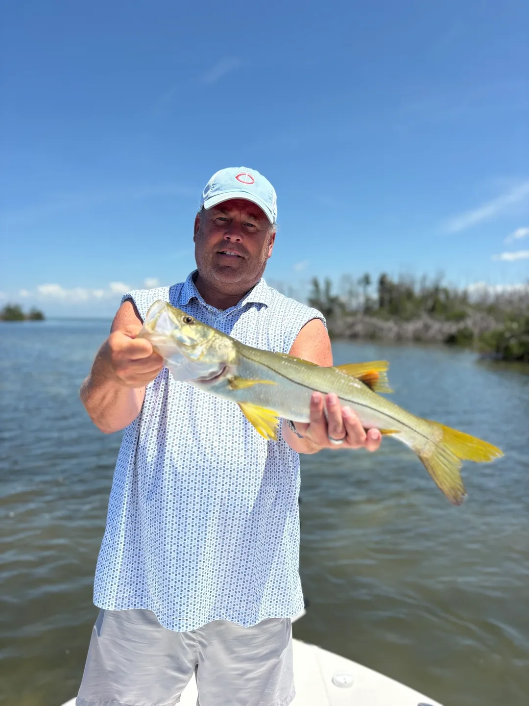 Proud angler with snook fish