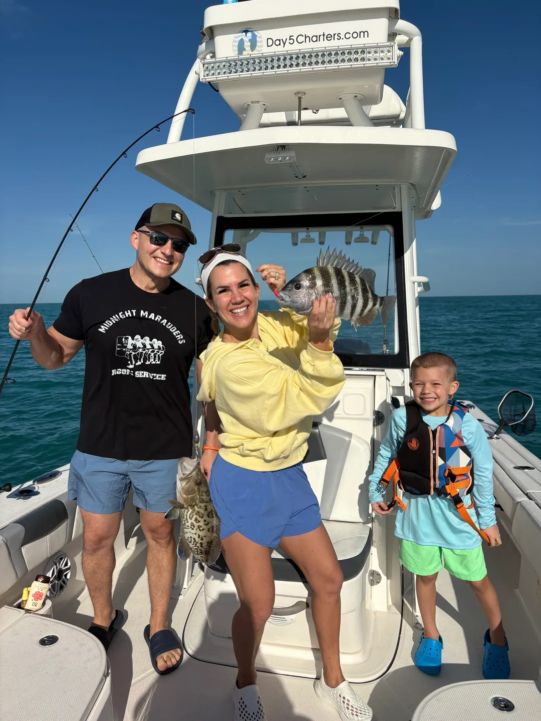 Family fishing trip on a boat